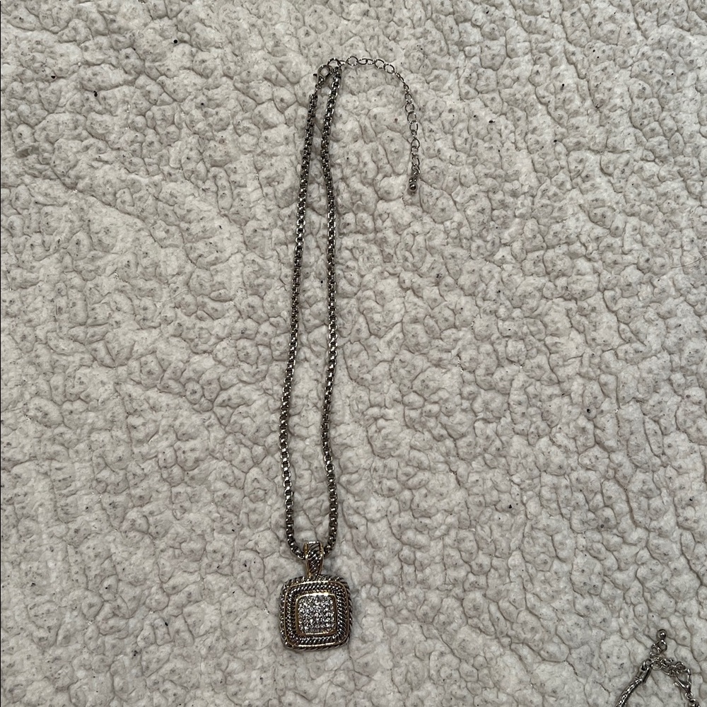 Silver Pendant Fashion Necklace
16” with 2” extender